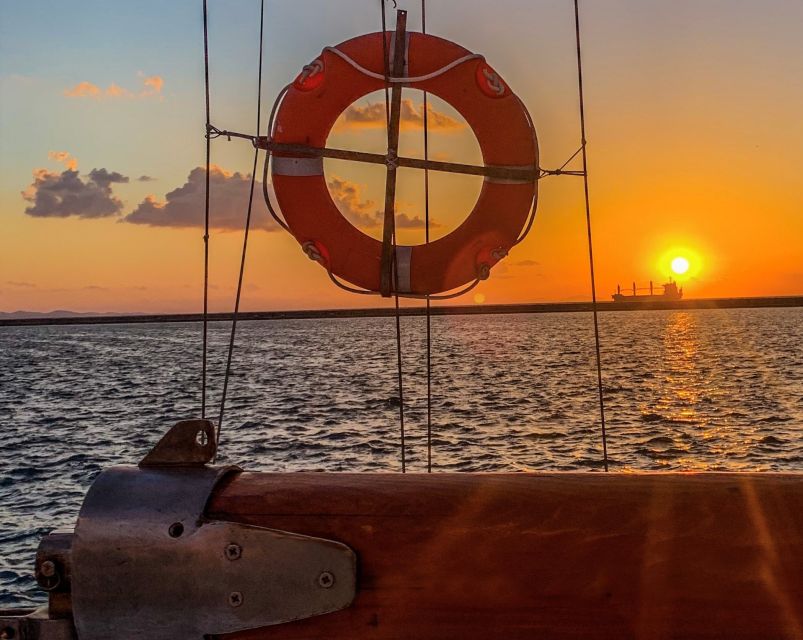 Rhodes Town: Sunset Boat Cruise with Drinks & Snacks - The bar, snacks, and what your price includes