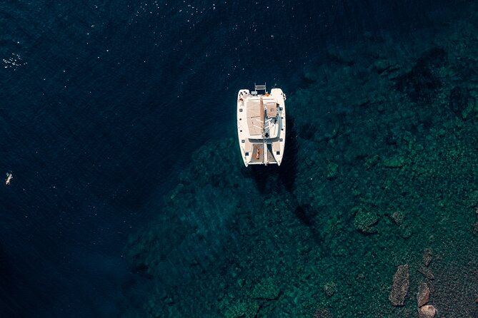 Romantic Sunset Catamaran Caldera Cruise incl. Meal & Drinks - Getting to the boat: allow extra time