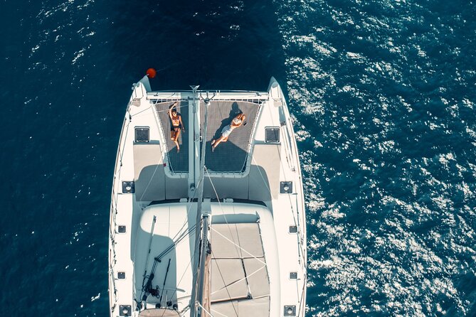 Romantic Sunset Catamaran Caldera Cruise incl. Meal & Drinks - Swimming near the volcano and the so-called hot springs