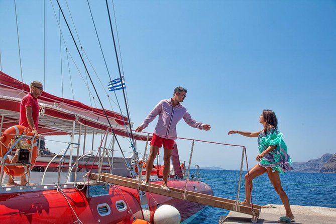Sailing Catamaran Cruise in Santorini with BBQ, Drinks and Transfer - White Beach, lunch, and the longest stop