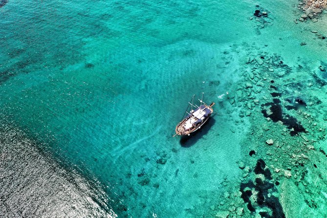 Sailing Trips with Cretan Sailing - Leaving Hersonissos aboard a traditional wooden boat
