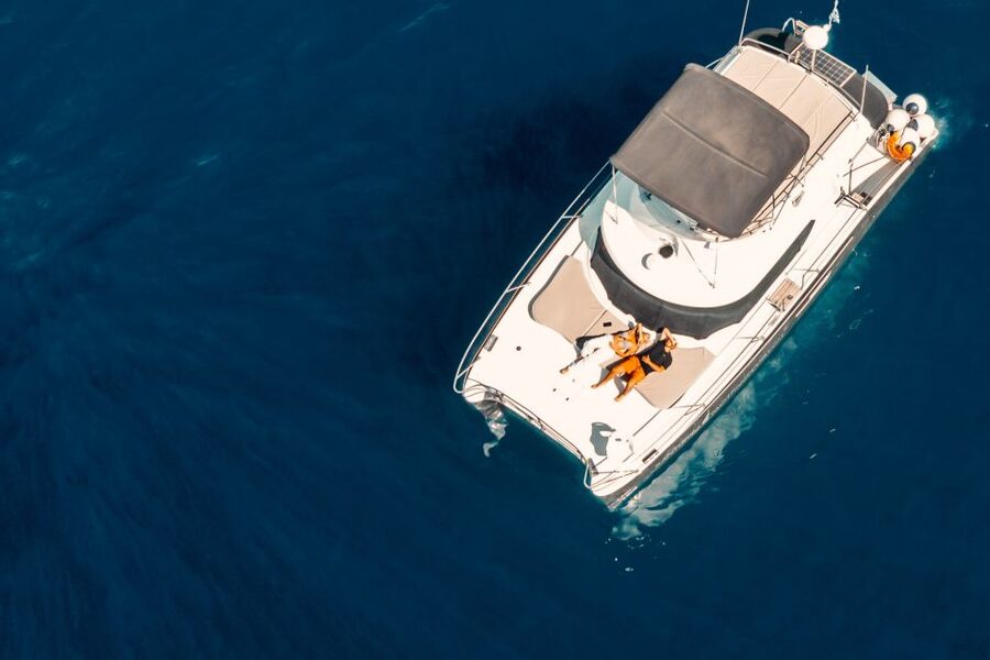 Santorini: Caldera Private Power Catamaran Cruise - Lunch with Santorinian wine and Greek mezedes