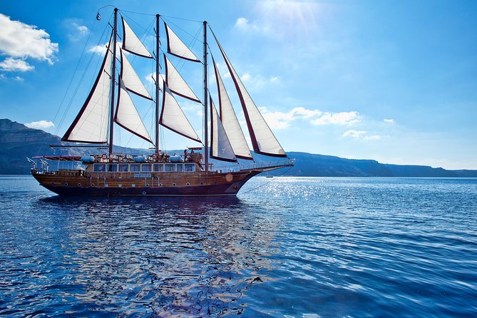 Santorini Caldera Sunset Sailing Cruise with Dinner and Wine - Greek dinner in Thirassia Bay