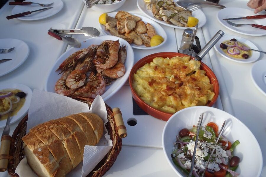 Santorini Caldera: Sunset Sailing Cruise with Meal - Seafood barbecue, local wine, and a quiet sunset