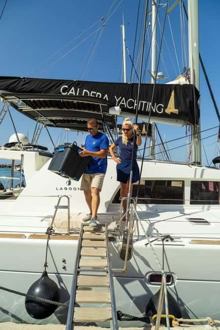 Santorini: Catamaran Cruise with Fresh Meal & Open Bar - Red and White Beach from the water