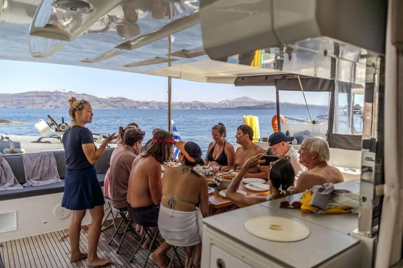 Santorini: Catamaran Cruise with Fresh Meal & Open Bar - Black Mountain and the first swim