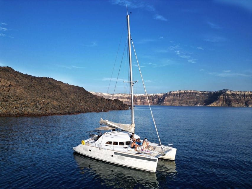 Santorini: Catamaran Cruise with Greek BBQ and Drinks - Why seeing Santorini from the sea matters