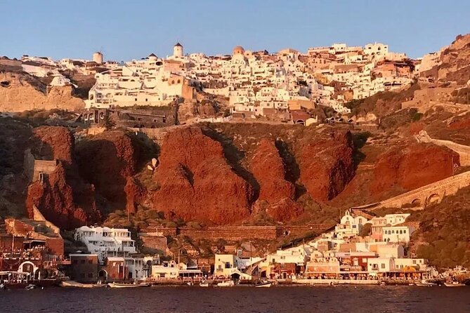 Santorini Catamaran Cruise with Greek Meal, Open-Bar and Sunset - The luxury route beneath Oia and Ammoudi Bay