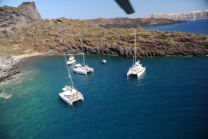 Santorini Classic Catamaran Cruise with BBQ, Drinks and Transfers - BBQ lunch or dinner on the catamaran