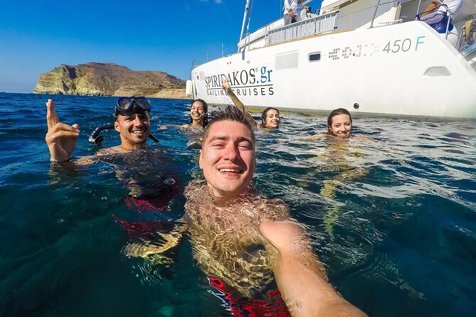 Santorini Classic Catamaran Cruise with BBQ, Drinks and Transfers - Choosing daytime or sunset sailing
