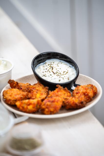 Santorini: Cooking Class with Lunch and Wine Tasting - What you may cook: tomato fritters, moussaka, and feta pie