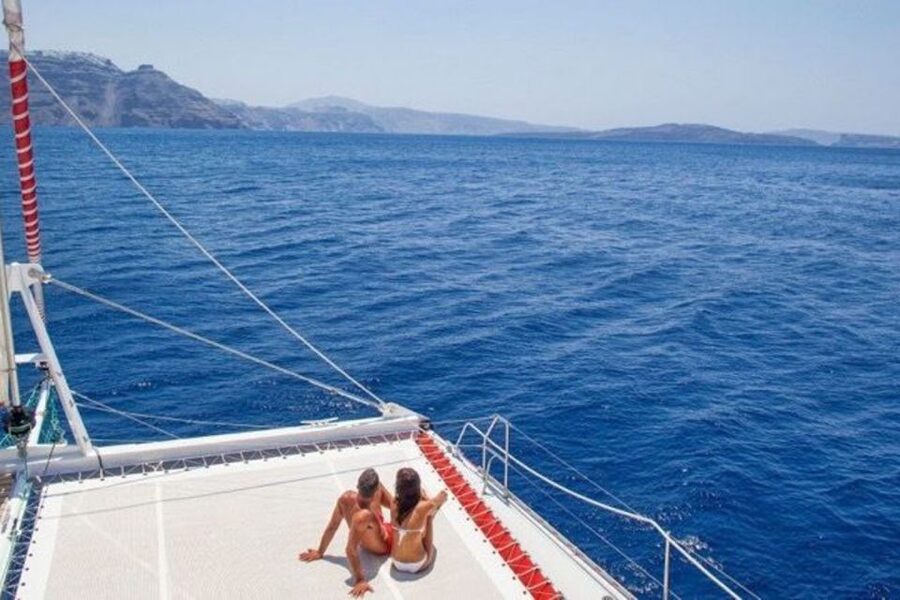 Santorini: Dream Catcher 5-hour Sailing Trip in the Caldera - A BBQ meal in a secluded bay