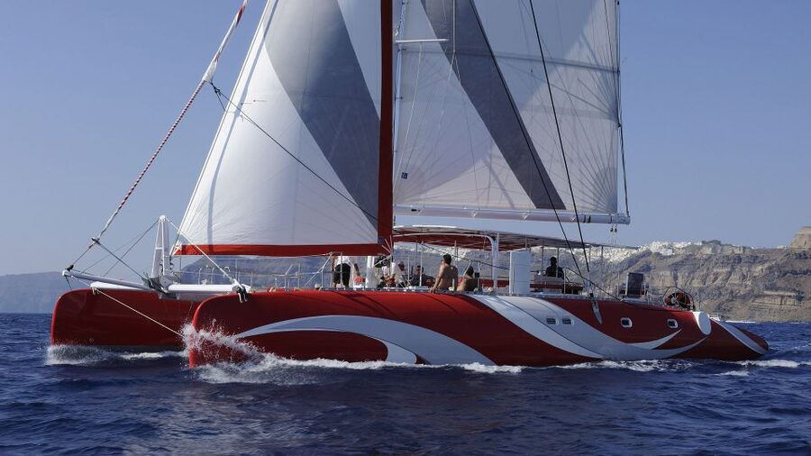 Santorini: Dream Catcher 5-hour Sailing Trip in the Caldera - Sailing past Akrotiri and the southern beaches