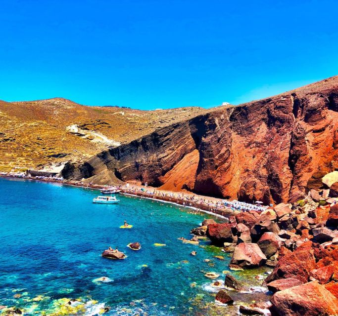 Santorini: Guided Island Day Trip with Beach Visit - The guide and bus experience