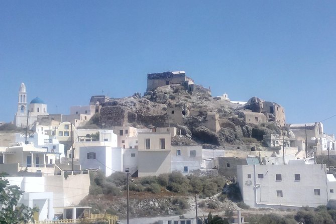 Santorini Highlights and Venetian Castles Small-Group Day Tour - Megalochori and Symposion add music to the itinerary