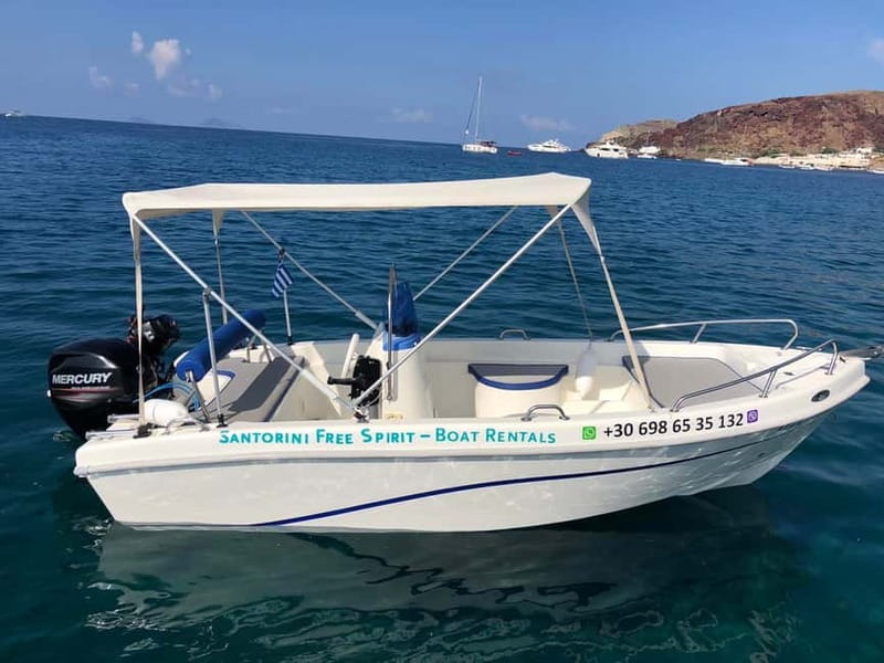 Santorini: License-Free Boat Rental with Ice, Water, & Fruit - Crossing Santorini’s volcanic caldera