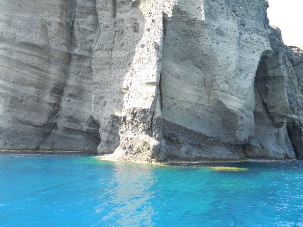 Santorini Luxury Catamaran Sunset Cruise with BBQ, Drink and Transfer - The crew and the onboard mood