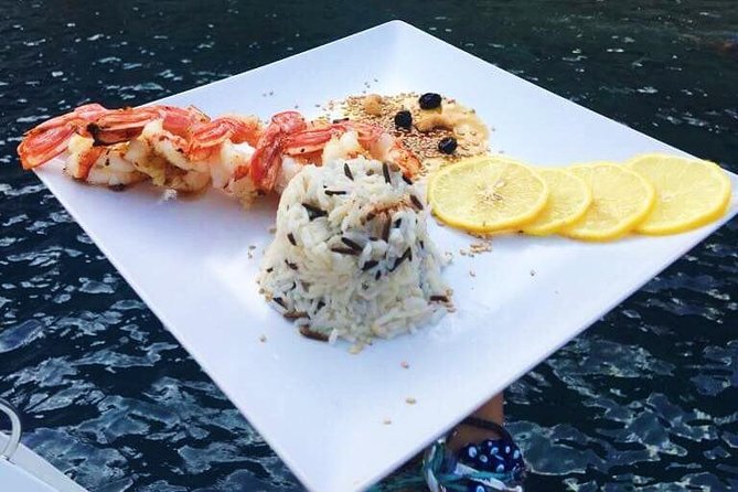 Santorini Luxury Catamaran Sunset Cruise with BBQ, Drink and Transfer - Sailing beside the volcano and Palea Kameni