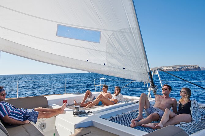 Santorini Platinum Catamaran Cruise with Meal, BBQ and Open Bar - Lunch near Thirassia comes with a full bar