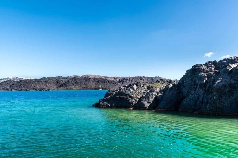 Santorini Port: 3 Hour Cruise to Volcano and Hot Springs - Walking across Nea Kameni volcano