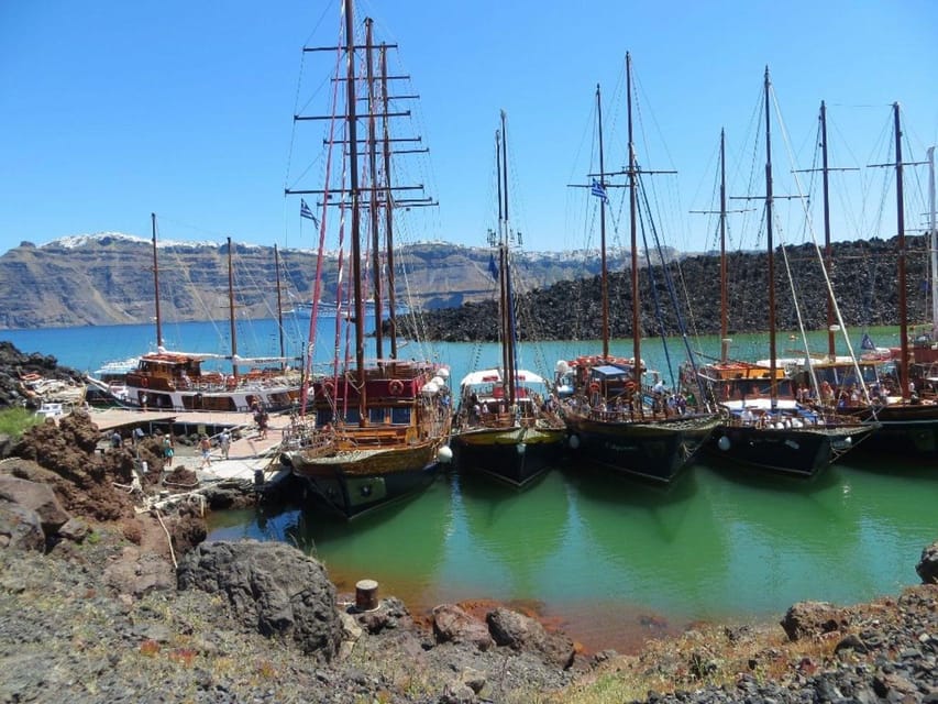 Santorini Port: Cruise to Volcano, Hot Springs & Thirassia - The return sail beneath Santorini’s cliffs