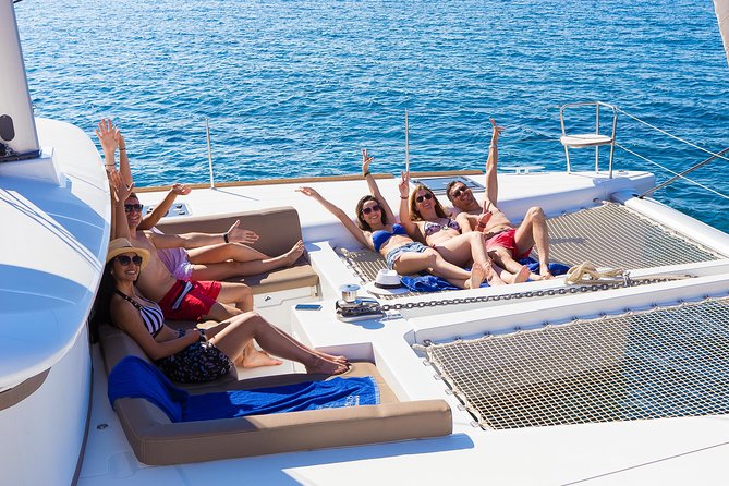 Santorini Private Catamaran Cruise with BBQ, Open Bar & Transfers - Indian Rocks and the caldera from sea level