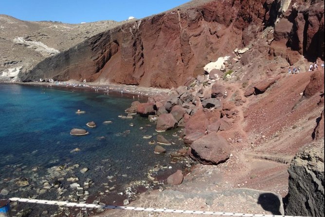 Santorini Private Driver: Explore Santorini - Port & Hotel Pickup - Fira’s Three Bells is a quick photo stop