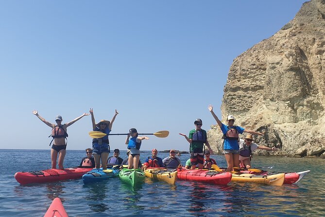 Santorini Sea Kayak - South Discovery, Small Group incl. Sea Caves and picnic - Paddling Past Red Beach