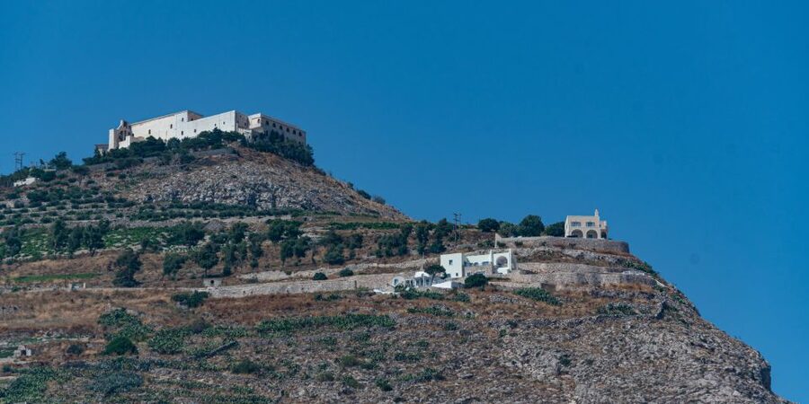 Santorini: Sunset Guided Tour with Hotel Pickup - Three Bells of Fira and the classic blue-dome photograph