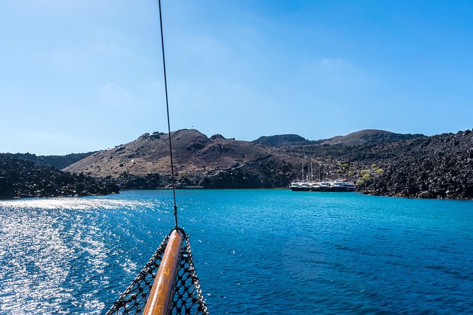 Santorini Volcano and Hot Springs Cruise Tour from Fira Old Port - Swimming from the boat at Palea Kameni
