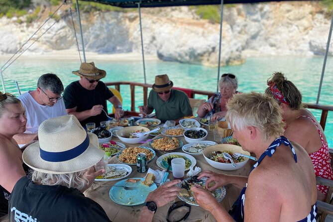 SemiPrivate Trip on 50ft Traditional Wooden Boat with Greek Lunch - First swim at green Arkos