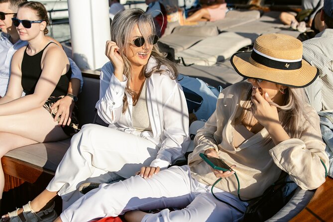 Sunset Dinner Cruise: Sunset, Swim, Drinks, and Dinner Onboard - Fresh dinner on a moving boat
