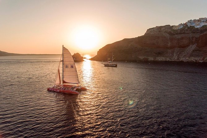Sunset Sailing Catamaran Cruise in Santorini with BBQ and Drinks - Starting at Ammoudi or Athinios port