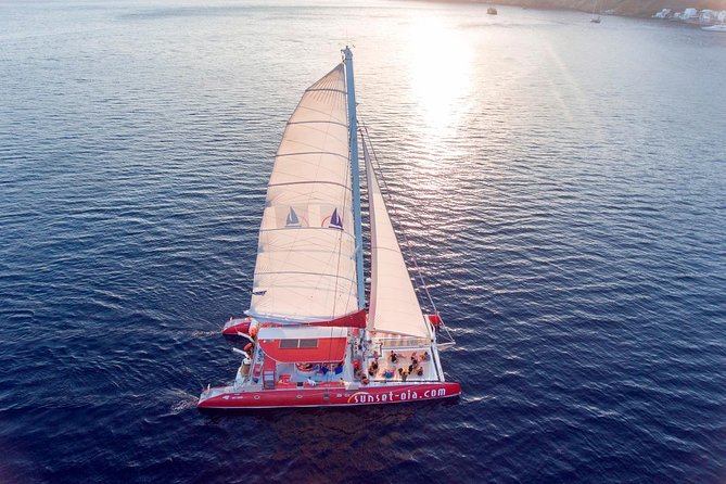 Sunset Sailing Catamaran Cruise in Santorini with BBQ and Drinks - Watching the Santorini sunset