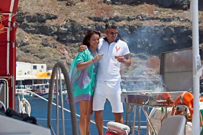 Sunset Sailing Catamaran Cruise in Santorini with BBQ and Drinks - Sailing beside Santorini’s volcano