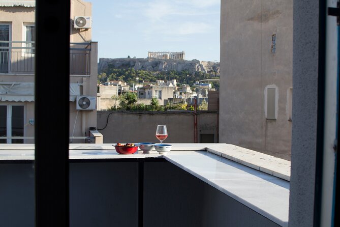 Traditional Greek cooking class and lunch or dinner with an Acropolis view - Main courses range from moussaka to winter comfort food