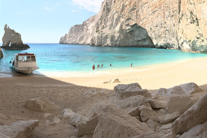 Zakynthos boat tour:Shipwreck& Local blue caves with 3 Swim Stops - Seeing the Panagiotis at Navagio