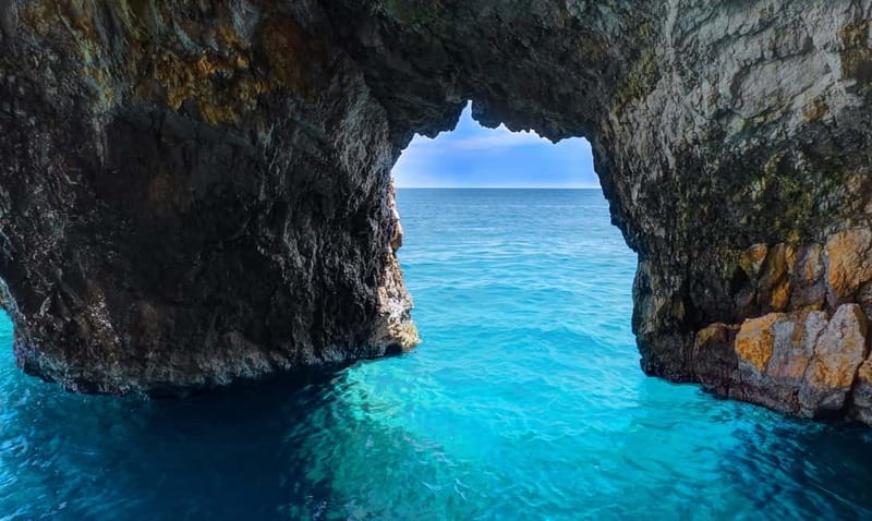 Zakynthos: Turtle Spotting Cruise with Glass-Bottom Boat - Swimming near the cliffs